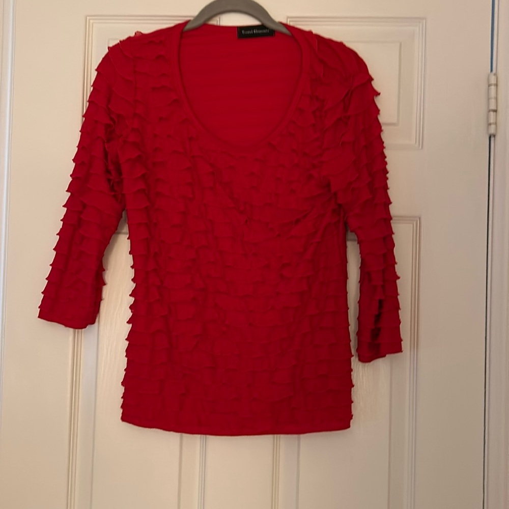 Red ruffled blouse